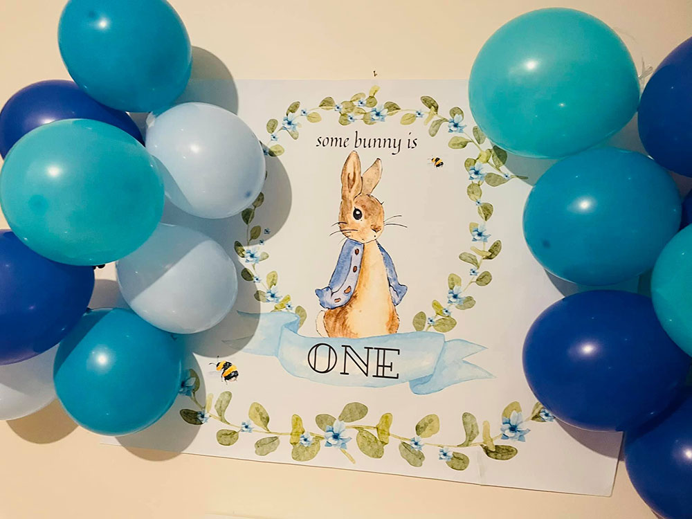 Somebunny is One theme invitations with balloons on the side