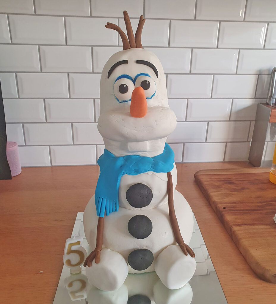 DIY Olaf cake made from fondant and buttercream