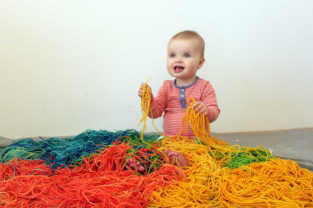 coloured pasta sensory play