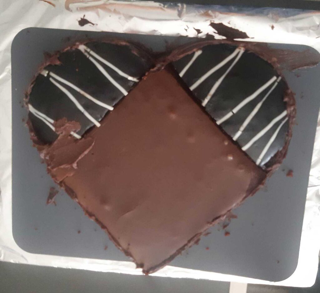 Cutting love heart cake