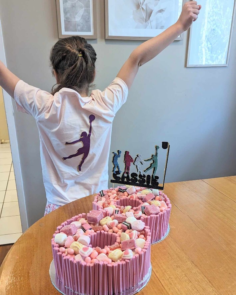 Netball party with birthday cake and personalised netball shirt
