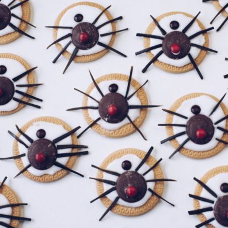 A plate of spider themed cookies